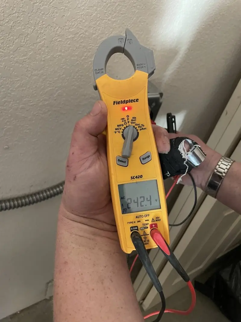 Voltage testing with clamp meter during Generator Installation in Laurel